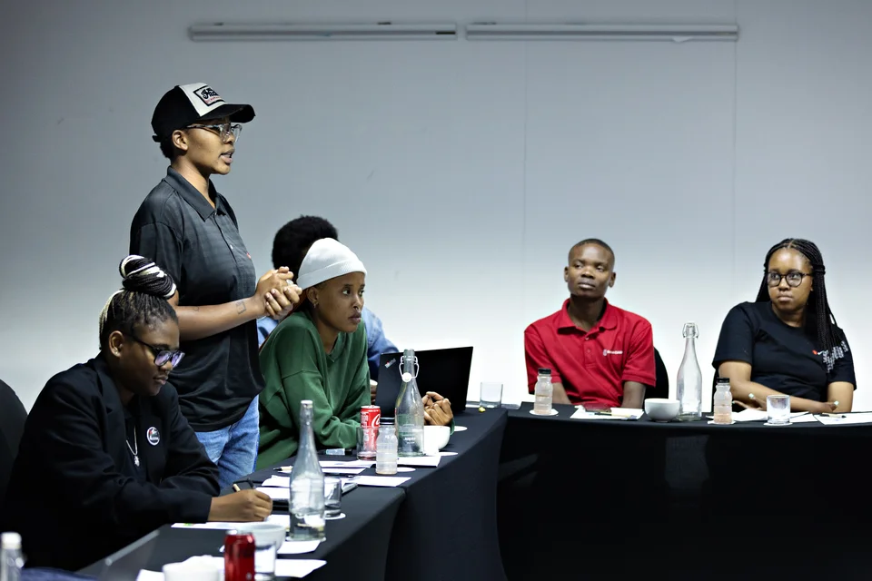 Young person talking in meeting