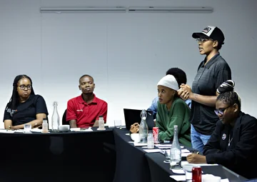 Young person talking in meeting